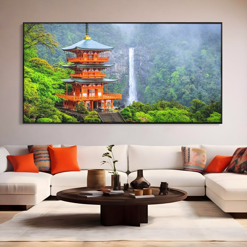 Tablou canvas cu tablou canvas cu pagoda si cascada, in rama de aluminiu negru, pe perete intr-un living